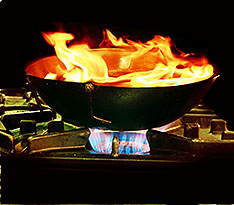 A Wok on Fire in Kitchen